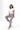 Woman sitting in satin pajama pants