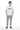 Light blue t-shirt with grey joggers and slides