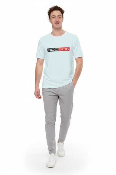 Light blue t-shirt with light grey tech joggers and minimalist sneakers