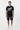 Look 1 — Solid Black + Boardshorts