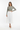 Look 3 - Feminine elegant with pleated midi skirt and heels