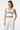 Look 4 - Styled with white linen high-waisted pants