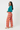 Look 5 – Teal zip-up jacket & gold necklaces