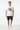 Look 9 — White + Boardshorts