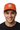 Male model close-up wearing orange trucker hat