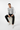 Male model in black chinos and white sneakers