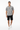 Male model in black shorts and white sneakers