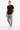 Male model standing one hand in pocket casual