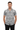 Male model standing with hands in pockets