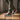 Man wearing colorful lace-ups with olive chinos on wooden floor