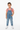 Middle Eastern boy in overalls