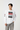 Model 8 in white one hand in pocket