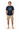 Navy blue tee with hands in pockets