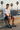 Navy boardshorts white tee skate park