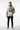 Oatmeal heather hoodie with tattooed model, one hand in pocket