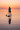 Paddleboarding glassy ocean pink sky