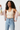 Racerback crop top with cardigan and jeans