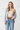 Racerback crop top with cardigan and jeans