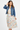 Racerback crop top with floral skirt and denim jacket