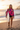 Rash Guard Holding Surfboard