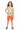 Red-haired child in board shorts