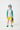 Red-haired child in yellow shorts