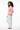 Side profile with white pants