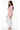 Side profile with white pants