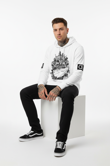 Sitting on cube with tattoos