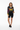 Styled with black fitted shorts