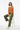 Sweater with Olive Linen Trousers Seated