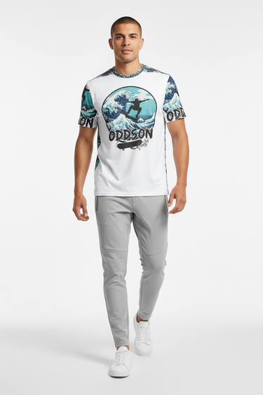 Wave rider tee with light grey tech joggers and minimalist sneakers