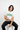White tee sitting pose