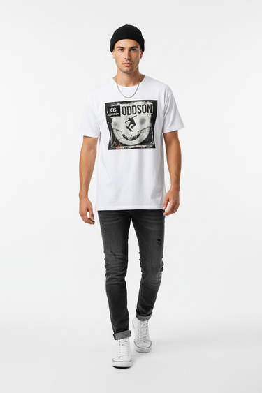 White tee walking pose