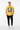 Yellow tee with black joggers and white sneakers