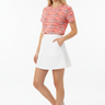 3/4 Front - White model, white mini skirt