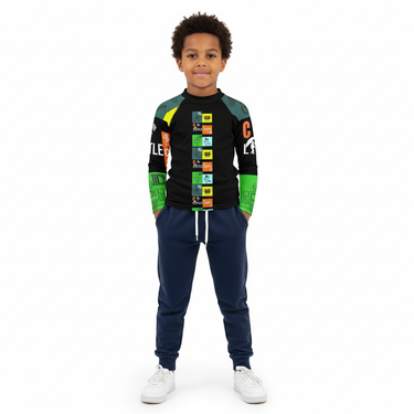 6-8 year old boy in Play Robo rash guard with sweatpants on white background