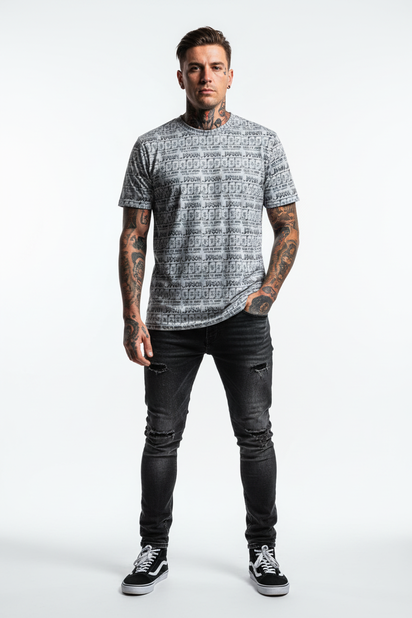 All-over print tee with tattooed model, one hand in pocket