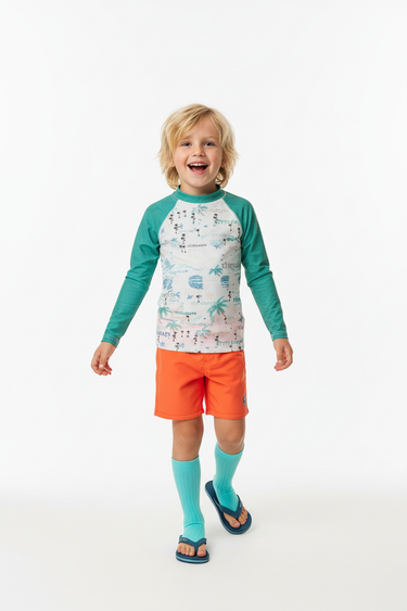 Blonde boy in orange shorts