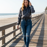 Blonde model — ripped jeans, boardwalk