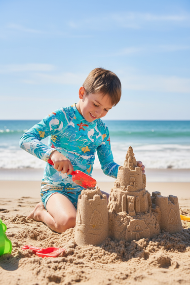 Boy Building Sandcastle