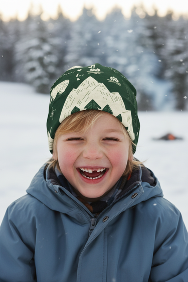 Boy laughing in wilderness beanie