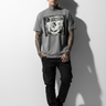 Charcoal tee with tattoos leaning