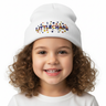 Close-up girl white beanie