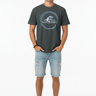 Dark heather grey tee with hands in pockets