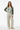 Female model - buttoned cardigan with beige linen pants