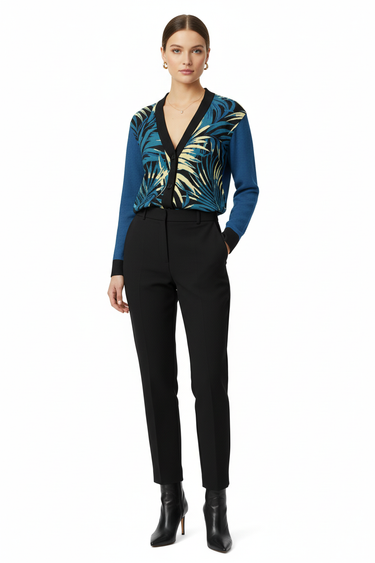 Female model - classy styling with tailored trousers and heels