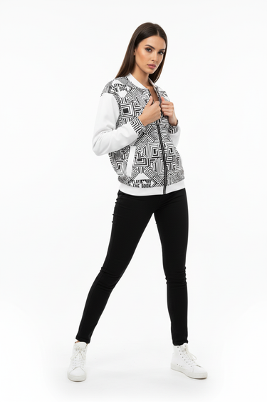 Female model in black skinny jeans and high-top sneakers