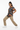Female model in khaki cargo pants and white sneakers