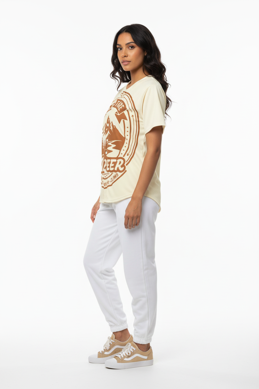 Female model in white joggers and tan sneakers
